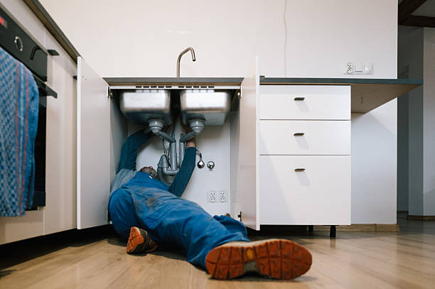 Professional Drain Cleaning technician working in Arlington Heights, WA